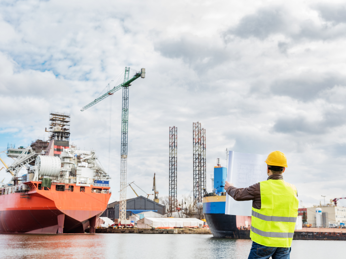 Engineers monitoring control systems onboard